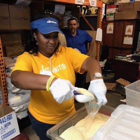 person helping with food prep