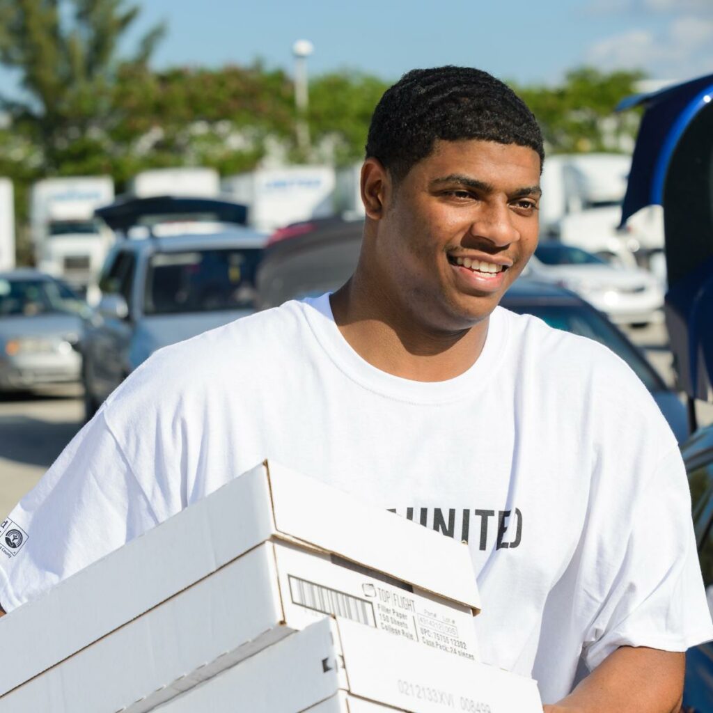 young man with boxes