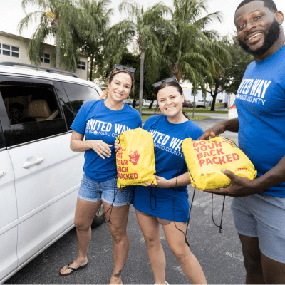 volunteers wearing blue tee shirts