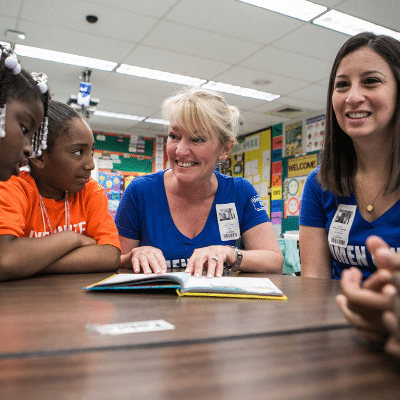 teachers and students reading